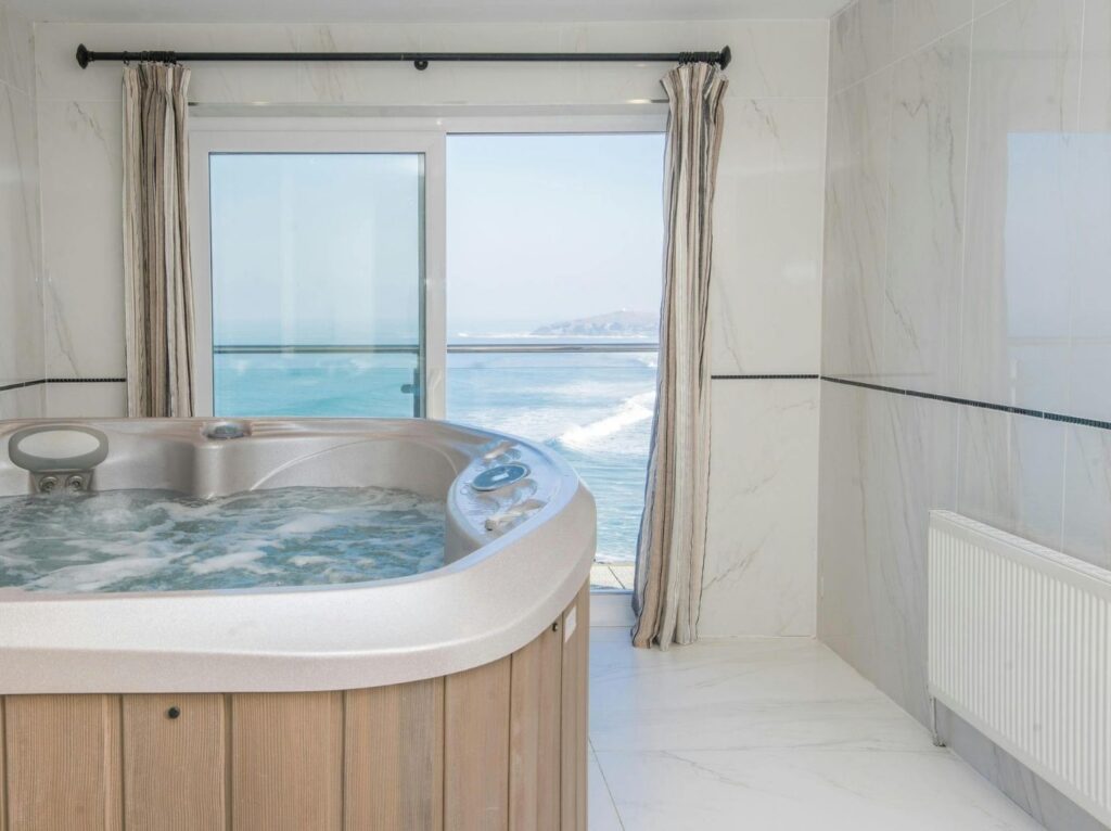 Fistral Beach Hotel bath overlooking the sea