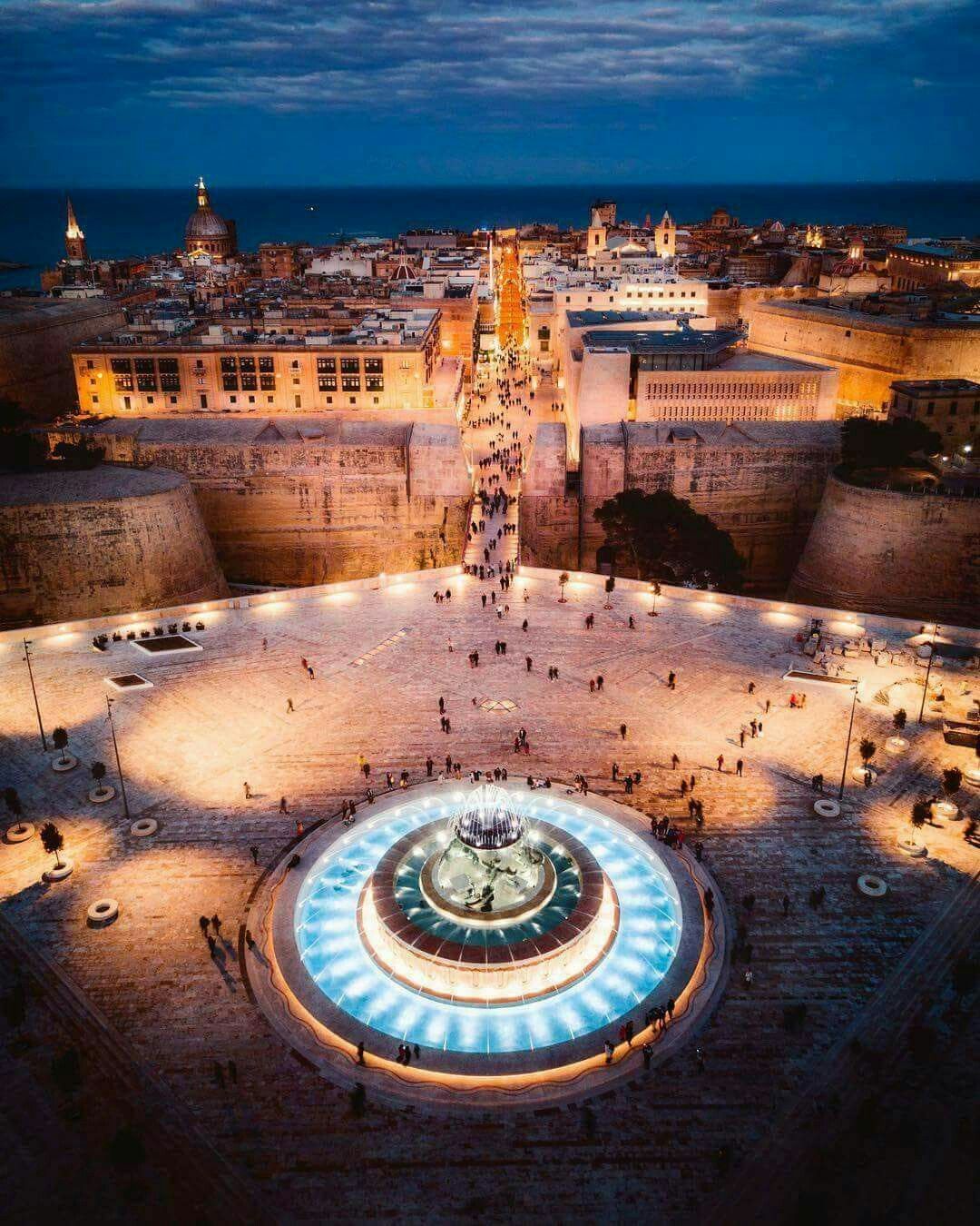 valetta at night triton fountain